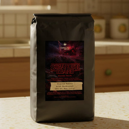 Coffee bag labeled 'Smaller Beans' on a kitchen counter